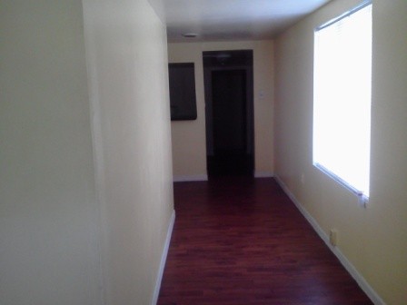 front unit, entrance off the living room and front door the front door is to the right of the photographer and the living room is to the left of the photographer.